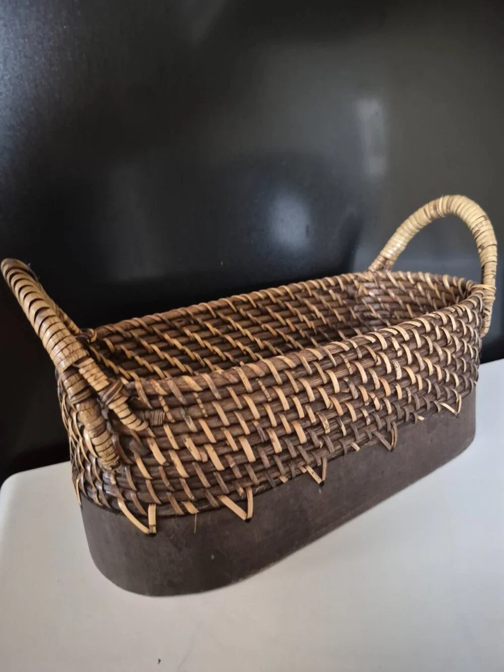 OVAL HAND-WOVEN WICKER STORAGE BASKET